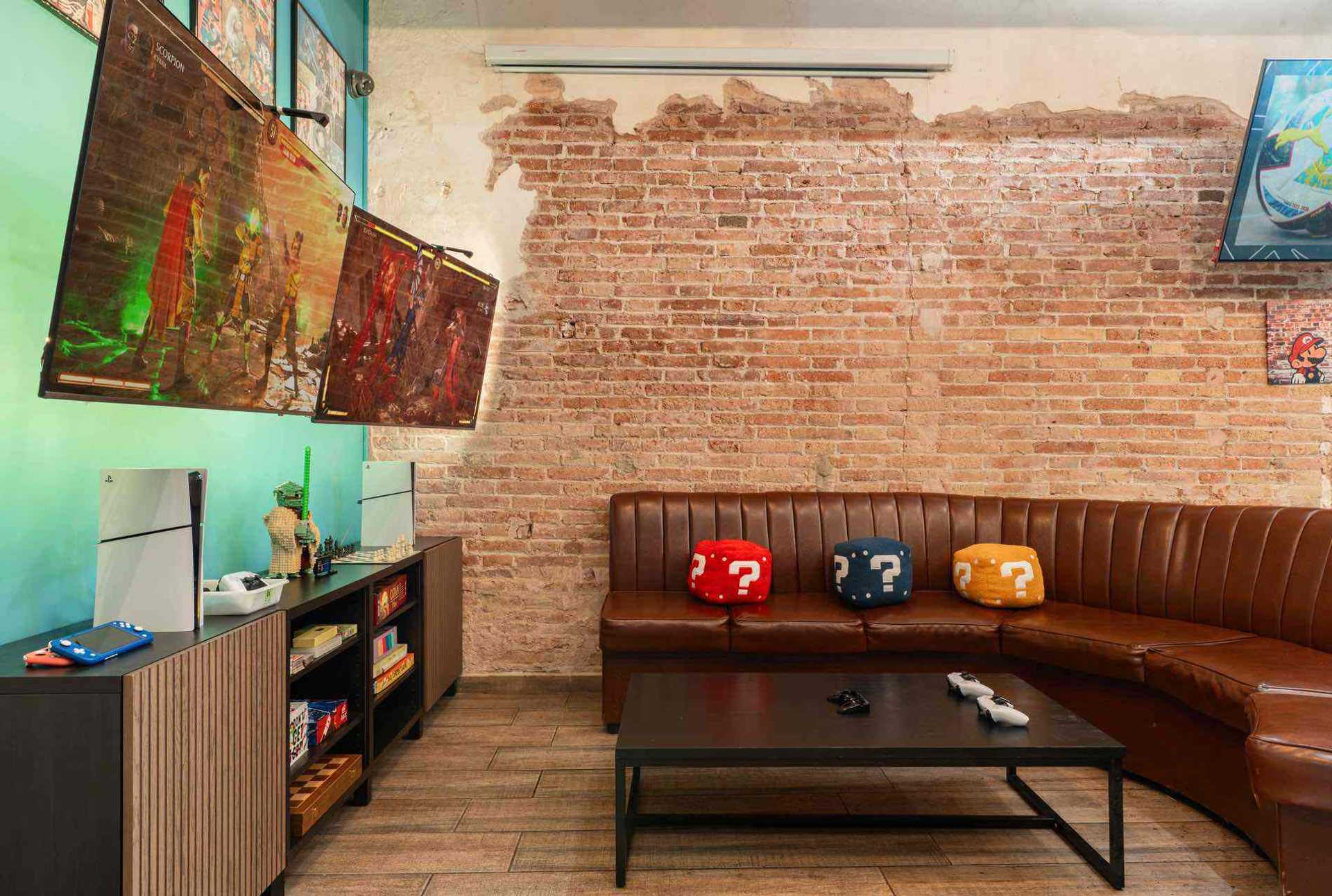 Gaming and TV zone at cannabis social club 1UP Barcelona